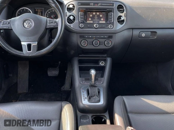 2013 Volkswagen Tiguan SE z VIN WVGBV7AX3DW544490, wystawiony jako Copart lot #82038874 z przebiegiem 149 169 mil mil oraz Czysty tytuł • Clean title. Historia ofert i sprzedaży dostępna na DreamBid. Obrazek 9.
