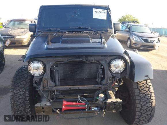 2017 Jeep Wrangler Unlimited Sahara with VIN 1C4BJWEG5HL635319, listed as a IAAI auction lot 42224748 with 141,214 mi miles and . Bid and sale history available at DreamBid. Image 13.