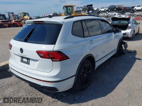 2022 Volkswagen Tiguan SE R-Line Black with VIN 3VVCB7AX5NM009696, listed as a IAAI auction lot 42364884 with 45,380 mi miles and . Bid and sale history available at DreamBid. Image 4.