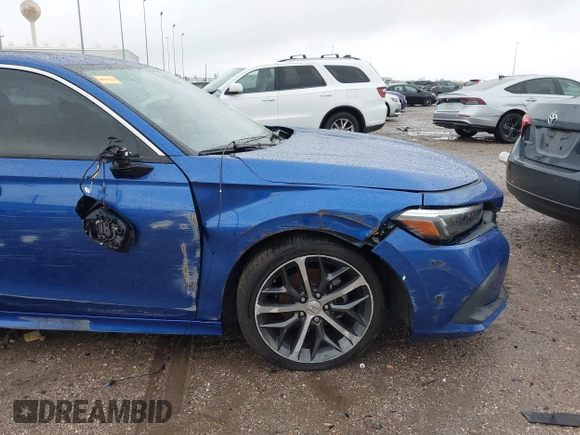 2023 Honda Civic Touring z VIN 2HGFE1F92PH317695, wystawiony jako IAAI lot #41556915 z przebiegiem 20 421 mil mil oraz . Historia ofert i sprzedaży dostępna na DreamBid. Obrazek 6.
