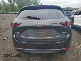 2018 Mazda CX-5 Grand Touring с VIN JM3KFBDM8J0424633, выставлен на аукционе Copart как лот 59888035 с пробегом 77 721 миль миль и Списание • Salvage title. История ставок и продаж доступна на DreamBid. Изображение 6.