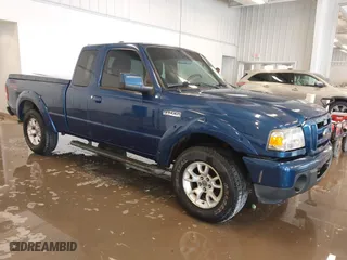 2011 Ford Ranger XLT with VIN 1FTLR4FE3BPA52049, listed as a IAAI auction lot 41394422 with 112,080 mi miles. Bid and sale history available at carsss.com. Image 1.
