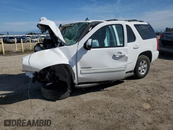 2013 GMC Yukon SLE with VIN 1GKS1AE03DR191410, listed as a Copart auction lot 48658234 with 121,572 mi miles and Salvage Title. Bid and sale history available at carsss.com. Image 1.