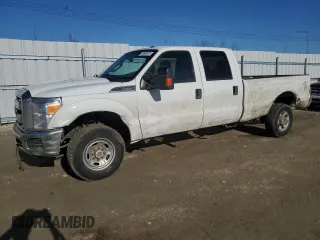 2015 Ford Super Duty F-250 SRW Lariat with VIN 1FT7W2B64FED33288, listed as a Copart auction lot 52687675 with 218,079 mi miles and Salvage Title. Bid and sale history available at carsss.com. Image 1.