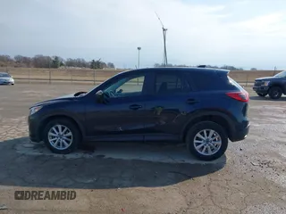 2015 Mazda CX-5 Touring with VIN JM3KE2CY0F0516589, listed as a IAAI auction lot 41707973 with 109,245 mi miles. Bid and sale history available at carsss.com. Image 14.