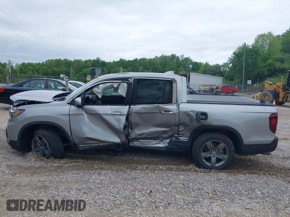 2022 Honda Ridgeline RTL с VIN 5FPYK3F5XNB003389, выставлен на аукционе IAAI как лот 42180799 с пробегом Не указан миль и . История ставок и продаж доступна на DreamBid. Изображение 14.