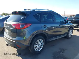 2016 Mazda CX-5 Touring with VIN JM3KE2CY4G0695947, listed as a IAAI auction lot 41824490 with 162,191 mi miles and . Bid and sale history available at carsss.com. Image 4.
