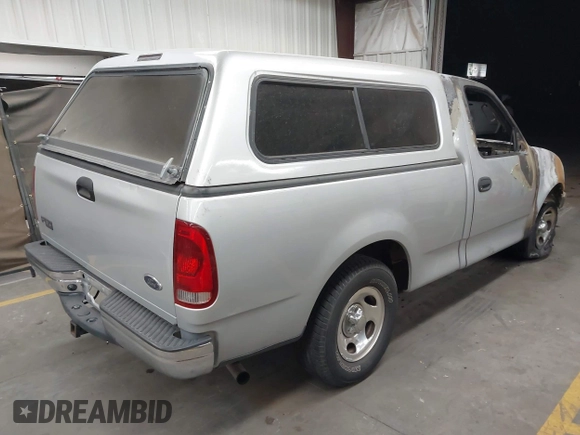 2004 Ford F-150 XL with VIN 2FTRF172X4CA52298, listed as a IAAI auction lot 42278927 with Not provided miles and . Bid and sale history available at DreamBid. Image 4.