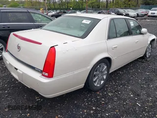 2010 Cadillac DTS 1SD z VIN 1G6KH5EYXAU121435, wystawiony jako IAAI lot #42175287 z przebiegiem Nie podano mil oraz . Historia ofert i sprzedaży dostępna na DreamBid. Obrazek 4.