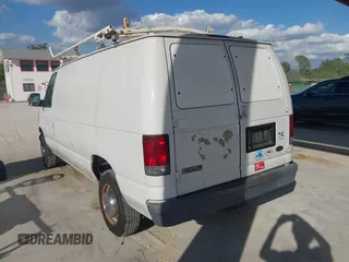 2005 Ford Econoline Cargo with VIN 1FTNE24L35HA46731, listed as a IAAI auction lot 41543863 with 179,541 mi miles. Bid and sale history available at carsss.com. Image 3.