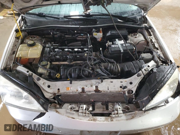 2007 Ford Focus S z VIN 1FAHP34N37W262789, wystawiony jako Copart lot #50814405 z przebiegiem 56 604 mil mil oraz Szkoda całkowita • Salvage title. Historia ofert i sprzedaży dostępna na DreamBid. Obrazek 11.