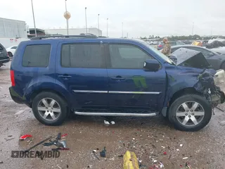 2013 Honda Pilot Touring with VIN 5FNYF4H95DB007125, listed as a IAAI auction lot 42493693 with Not provided miles and . Bid and sale history available at DreamBid. Image 13.