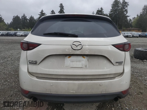 2021 Mazda CX-5 Signature with VIN JM3KFBEY3M0410998, listed as a Copart auction lot 54868885 with 73,207 mi miles and Salvage Title. Bid and sale history available at carsss.com. Image 6.