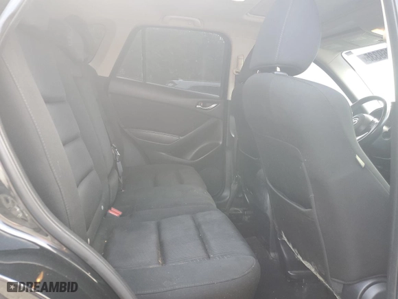 2014 Mazda CX-5 Touring with VIN JM3KE2CY7E0427312, listed as a Copart auction lot 52869335 with 192,903 mi miles and Salvage Title. Bid and sale history available at carsss.com. Image 10.