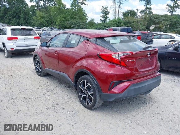 2018 Toyota C-HR XLE with VIN NMTKHMBX6JR054483, listed as a IAAI auction lot 42759739 with 89,820 mi miles and . Bid and sale history available at DreamBid. Image 3.