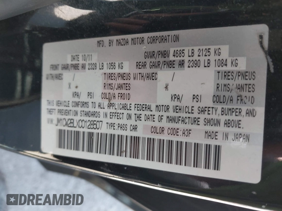 2012 Mazda 5 Sport with VIN JM1CW2BLXC0128507, listed as a IAAI auction lot 42145486 with 175,494 mi miles. Bid and sale history available at carsss.com. Image 9.