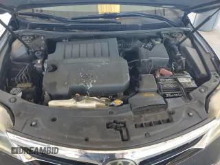 2013 Toyota Avalon XLE z VIN 4T1BK1EB1DU003129, wystawiony jako Copart lot #57685895 z przebiegiem 169 914 mil mil oraz Szkoda całkowita • Salvage title. Historia ofert i sprzedaży dostępna na DreamBid. Obrazek 11.