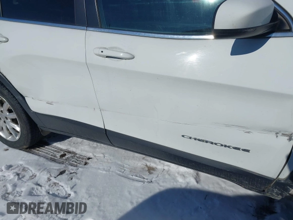 2015 Jeep Cherokee Limited with VIN 1C4PJMDS9FW718151, listed as a IAAI auction lot 41344018 with 124,185 mi miles and . Bid and sale history available at DreamBid. Image 18.