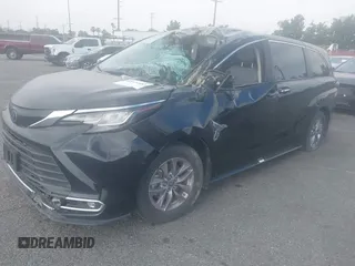 2022 Toyota Sienna XLE z VIN 5TDYRKEC8NS123217, wystawiony jako IAAI lot #42224483 z przebiegiem 73 802 mil mil oraz . Historia ofert i sprzedaży dostępna na DreamBid. Obrazek 2.