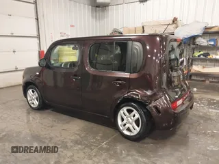 2009 Nissan Cube S z VIN JN8AZ28R39T124465, wystawiony jako IAAI lot #40769739 z przebiegiem 145 993 mil mil oraz . Historia ofert i sprzedaży dostępna na DreamBid. Obrazek 3.