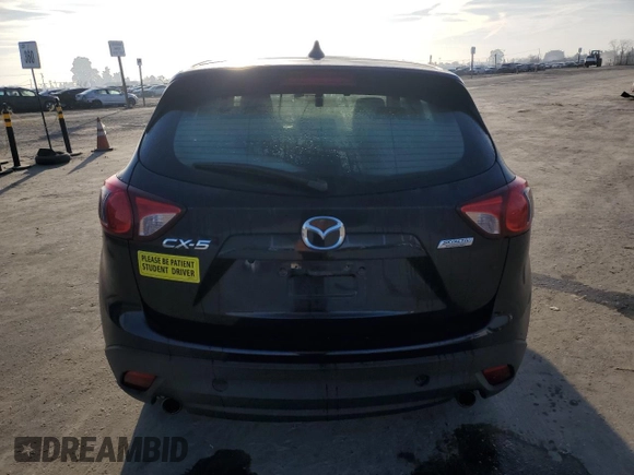 2015 Mazda CX-5 Sport z VIN JM3KE2BE6F0491107, wystawiony jako Copart lot #42462395 z przebiegiem 82 528 mil mil oraz Szkoda całkowita • Salvage title. Historia ofert i sprzedaży dostępna na DreamBid. Obrazek 6.