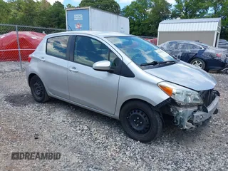 2012 Toyota Yaris L with VIN JTDKTUD33CD527720, listed as a IAAI auction lot 39764258 with 118,041 mi miles. Bid and sale history available at carsss.com. Image 1.