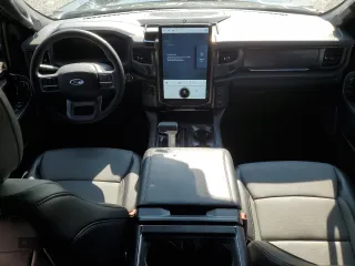 2023 Ford F-150 Lightning Pro with VIN 1FTVW1EV5PWG63666, listed as a Copart auction lot 60998415 with 35,089 mi miles and Salvage title. Bid and sale history available at DreamBid. Image 8.