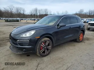 2011 Porsche Cayenne with VIN WP1AA2A22BLA03446, listed as a Copart auction lot 52012775 with 220,907 mi miles and Clean title. Bid and sale history available at DreamBid. Image 1.
