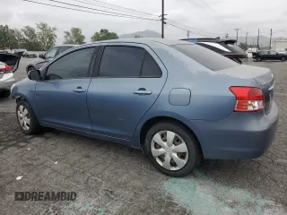 2010 Toyota Yaris with VIN JTDBT4K39A1393586, listed as a Copart auction lot 52240095 with 180,235 mi miles and Clean Title. Bid and sale history available at DreamBid. Image 2.
