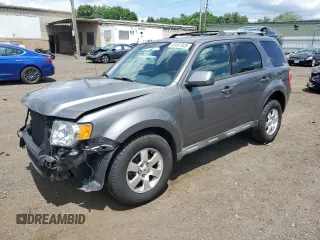2011 Ford Escape Limited with VIN 1FMCU9EG7BKC24011, listed as a Copart auction lot 63497945 with 113,360 mi miles and Salvage title. Bid and sale history available at DreamBid. Image 1.