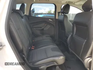 2013 Ford Escape Titanium with VIN 1FMCU0J95DUB50842, listed as a Copart auction lot 64188065 with 99,302 mi miles and Salvage title. Bid and sale history available at DreamBid. Image 11.