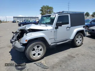 2007 Jeep Wrangler Sahara с VIN 1J4FA54157L180246, выставлен на аукционе Copart как лот 52506155 с пробегом 70 766 миль миль и Списание • Salvage title. История ставок и продаж доступна на DreamBid. Изображение 1.