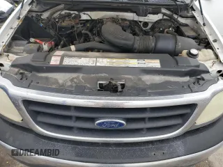 2000 Ford F-150 with VIN 1FTRF18W8YKA60791, listed as a Copart auction lot 45215895 with 157,885 mi miles and Clean title. Bid and sale history available at DreamBid. Image 11.
