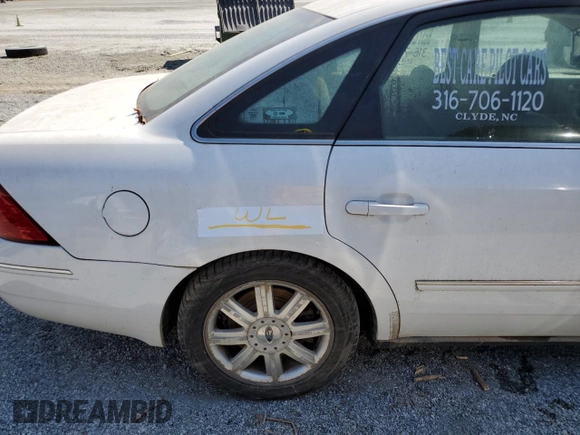 2005 Ford Five Hundred Limited with VIN 1FAFP28135G201703, listed as a Copart auction lot 74421714 with 114,247 mi miles and Salvage Title. Bid and sale history available at carsss.com. Image 12.