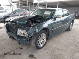 2006 Chrysler 300 C with VIN 2C3KA63H66H318725, listed as a IAAI auction lot 41629398 with 157,367 mi miles. Bid and sale history available at carsss.com. Image 18.