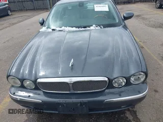 2006 Jaguar XJ with VIN SAJWA71B16SG50490, listed as a IAAI auction lot 41964002 with 114,270 mi miles. Bid and sale history available at carsss.com. Image 6.