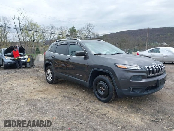 2014 Jeep Cherokee Latitude with VIN 1C4PJMCS5EW201459, listed as a IAAI auction lot 42092653 with 147,430 mi miles. Bid and sale history available at carsss.com. Image 1.