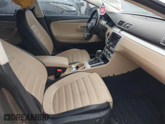 2013 Volkswagen CC Sport with VIN WVWBP7AN1DE520434, listed as a IAAI auction lot 41565789 with 273,503 mi miles. Bid and sale history available at carsss.com. Image 5.