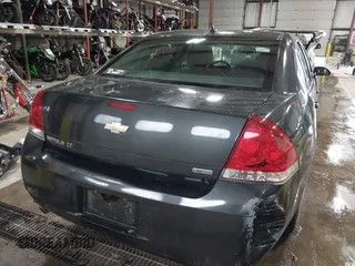 2016 Chevrolet Impala LT with VIN 2G1WB5E36G1186557, listed as a IAAI auction lot 41028346 with 106,856 mi miles and . Bid and sale history available at DreamBid. Image 16.