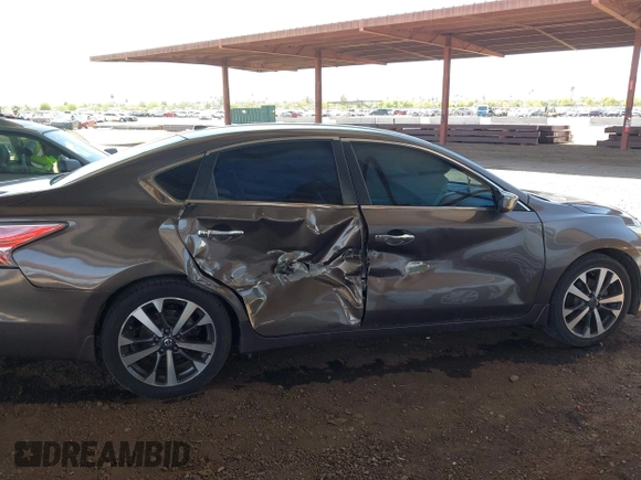 2015 Nissan Altima SL z VIN 1N4AL3AP0FC233740, wystawiony jako IAAI lot #42239684 z przebiegiem 111 970 mil mil oraz . Historia ofert i sprzedaży dostępna na DreamBid. Obrazek 13.