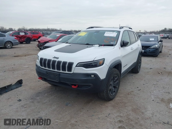 2019 Jeep Cherokee Trailhawk with VIN 1C4PJMBN6KD124023, listed as a IAAI auction lot 41432217 with 76,934 mi miles and . Bid and sale history available at DreamBid. Image 2.