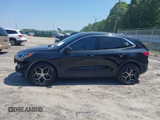 2021 Ford Escape SE z VIN 1FMCU0G66MUB26983, wystawiony jako IAAI lot #42144053 z przebiegiem 60 614 mil mil oraz . Historia ofert i sprzedaży dostępna na DreamBid. Obrazek 15.