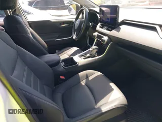 2023 Toyota RAV4 Hybrid XLE Premium with VIN JTMB6RFV0PD087237, listed as a IAAI auction lot 42606802 with 16,872 mi miles and . Bid and sale history available at DreamBid. Image 5.
