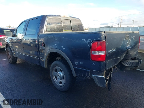 2005 Ford F-150 XLT with VIN 1FTRW12W25KB58736, listed as a IAAI auction lot 41119113 with 218,797 mi miles. Bid and sale history available at carsss.com. Image 3.