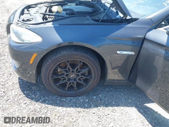 2013 BMW 5 Series 528i xDrive with VIN WBAXH5C57DD114603, listed as a IAAI auction lot 42592212 with 133,058 mi miles and . Bid and sale history available at DreamBid. Image 6.