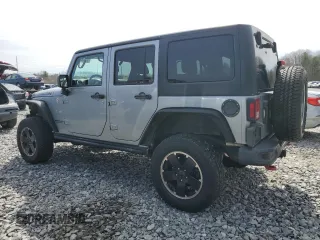 2015 Jeep Wrangler Unlimited Rubicon Hard Rock with VIN 1C4HJWFG4FL575054, listed as a Copart auction lot 51672655 with 130,405 mi miles and Clean title. Bid and sale history available at DreamBid. Image 2.
