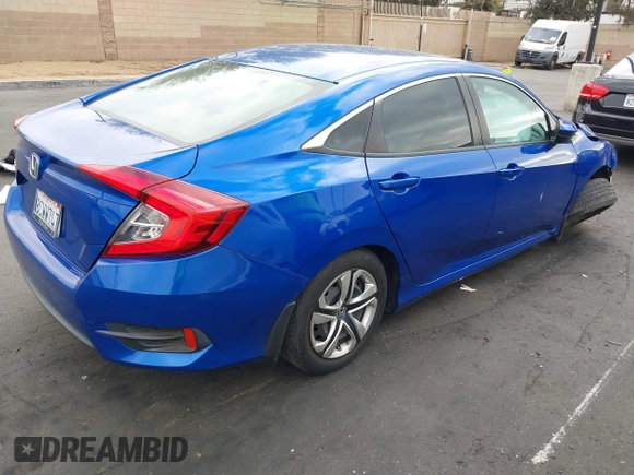 2018 Honda Civic LX with VIN 2HGFC2F51JH527351, listed as a IAAI auction lot 42071411 with 88,606 mi miles and . Bid and sale history available at DreamBid. Image 4.