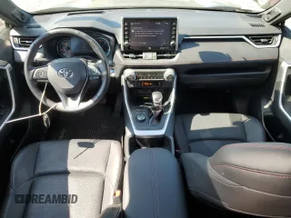2022 Toyota RAV4 XSE with VIN JTMFB3FV9ND101157, listed as a Copart auction lot 59044315 with 54,591 mi miles and Salvage title. Bid and sale history available at DreamBid. Image 8.