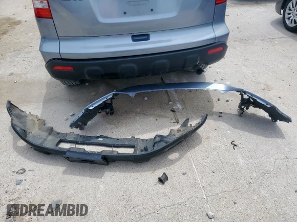 2009 Honda CR-V EX z VIN JHLRE38559C011942, wystawiony jako Copart lot #56342865 z przebiegiem 207 505 mil mil oraz Szkoda całkowita • Salvage title. Historia ofert i sprzedaży dostępna na DreamBid. Obrazek 13.