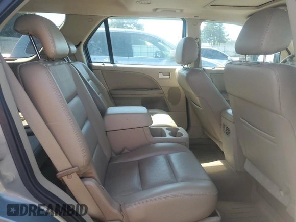 2007 Ford Freestyle Limited z VIN 1FMDK06117GA06091, wystawiony jako Copart lot #71226554 z przebiegiem 117 663 mil mil oraz Szkoda całkowita • Salvage title. Historia ofert i sprzedaży dostępna na DreamBid. Obrazek 11.